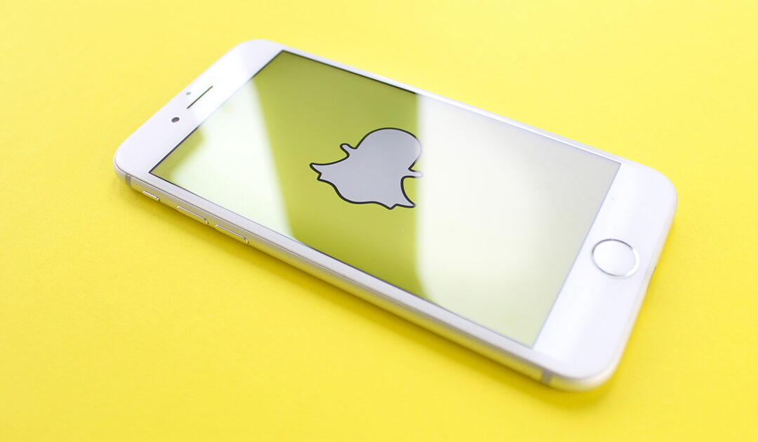 A phone with the Snapchat icon displayed